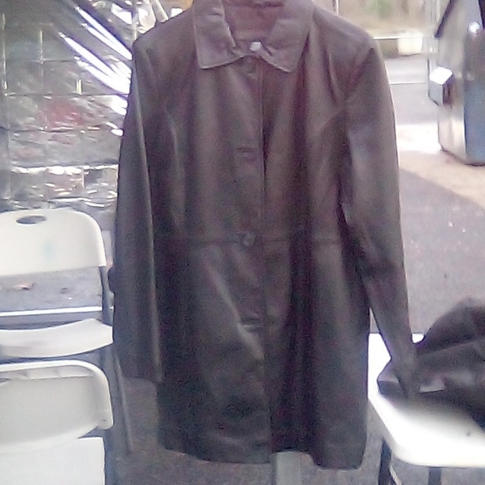 This a new real leather mid length jacket